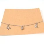 Stainless steel anklet with dangling charms, in several variations - Image 6